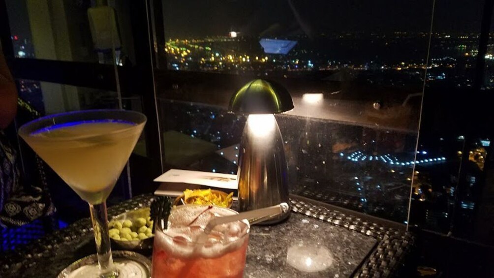 Drinks on a table at Vertigo TOO Sky Bar at Banyan Tree