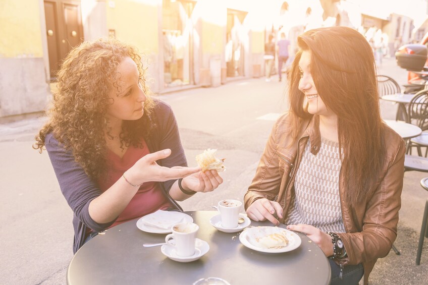 Women at an outdoor cafe in Rome