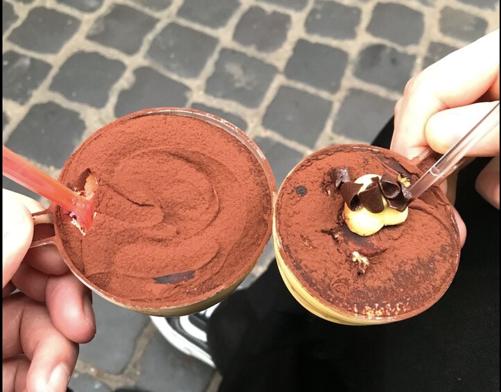 People with tiramisu in Rome