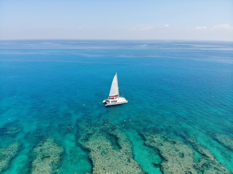 Sailboat in bright blue waters of Key West