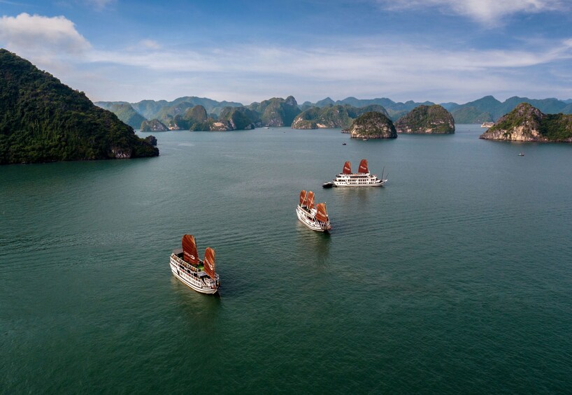 Aerial view of the 3-star Junk Boat Cruise boats on Halong Bay 