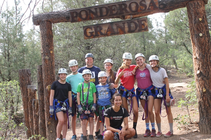 Group pose before zip lining in Durango, Colorado