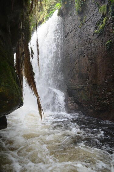 Steep waterfall against rockface in Presidente Figueiredo, Brazil
