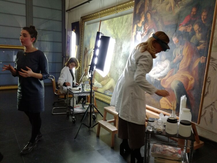 Tour guide speaks as experts work restoring Caravaggio paintings