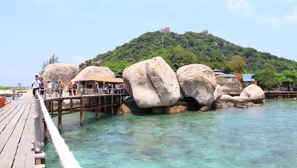 Guests walking along a boardwalk in Koh Tao 