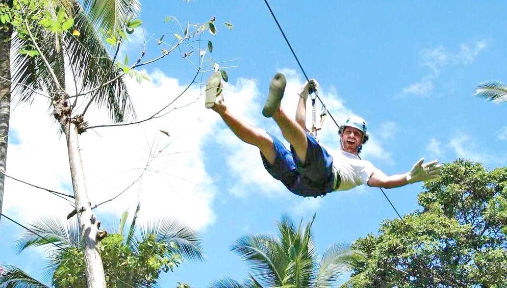 Man ziplining in Ko Samui