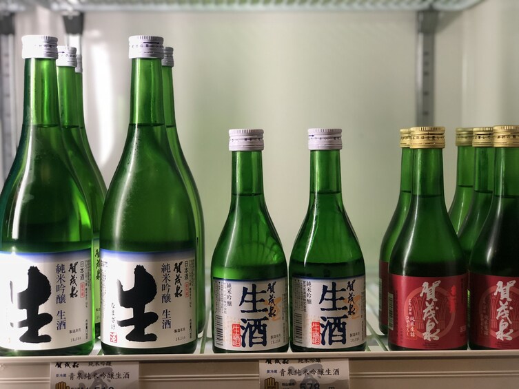 Show item 3 of 10. Different-sized bottles of sake