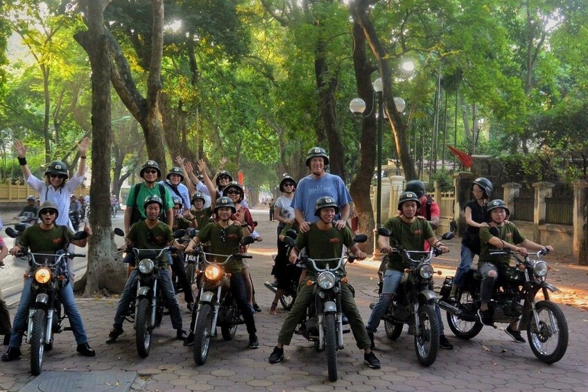 Tour group pose in downtown Hanoi