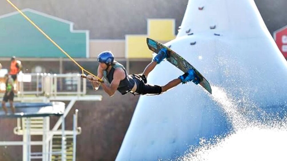 Person wakeboarding iin mid air