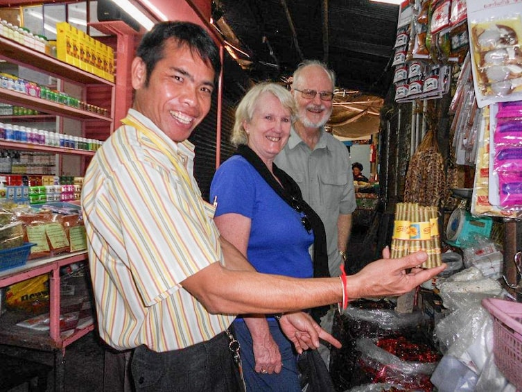 Tour group in a store in Thailand