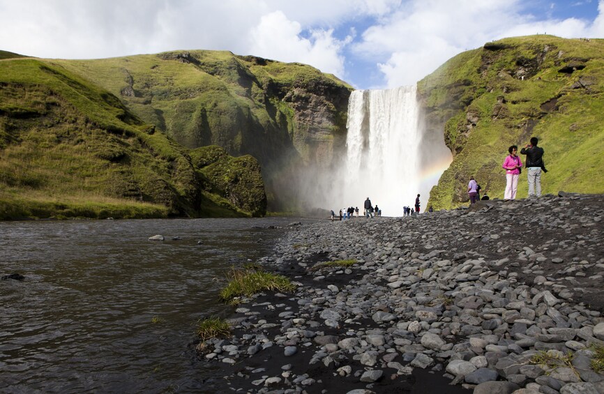 Tourists at Skógafoss Waterfall