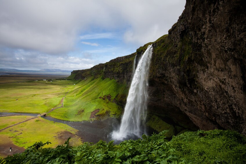 Side view of large waterfall in Iceland