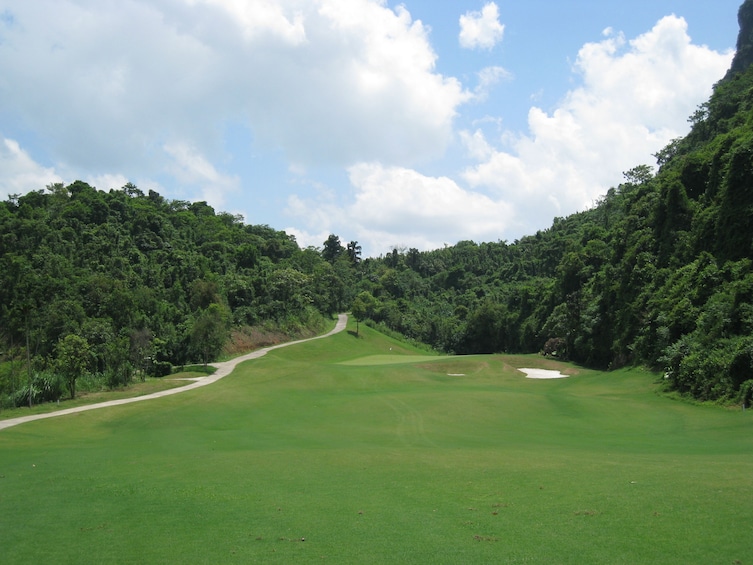 Golf course surrounded by trees in Vietnam
