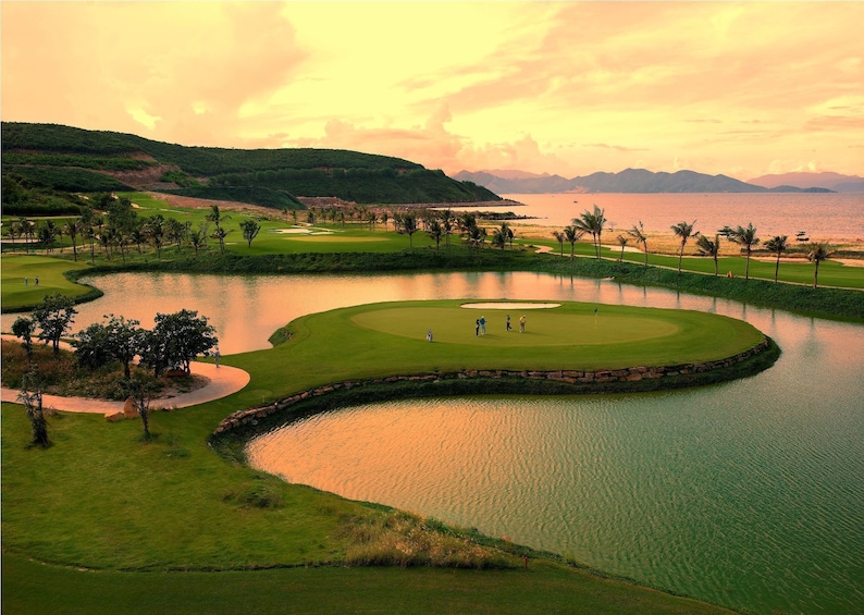 Aerial view of Vietnamese golf course at sunset