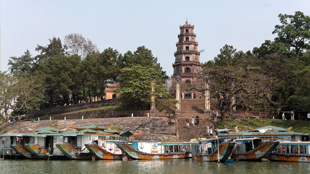 Boats and Thien Mu Pagoda in Hue, Vietnam