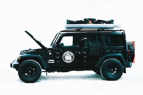 Jeep Wrangler with Rooftop Tent & Camping Gear