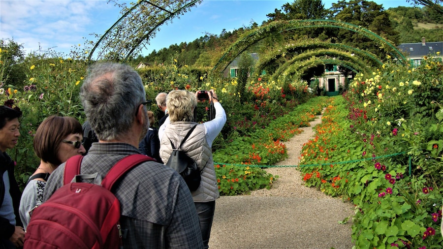 Tourists visiting a garden in Giverny