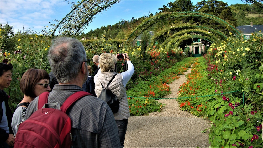 Tourists visiting a garden in Giverny 