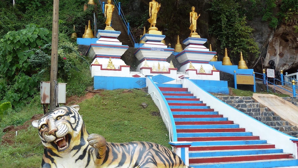 Colorful exterior of Tiger Cave Temple in Krabi, Thailand