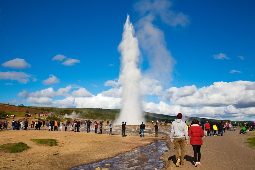 Visitors at the geysir geothermal area in Iceland in Summer