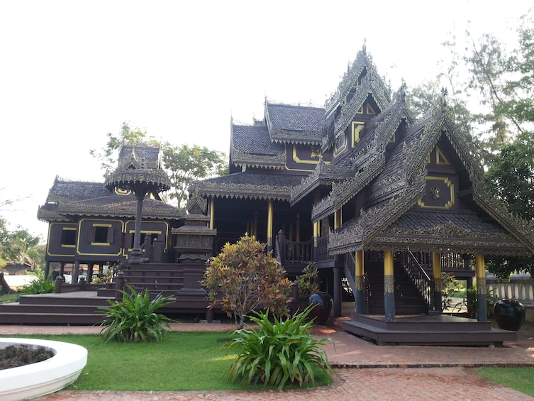 Black and gold temple at the Ancient City in Bangkok