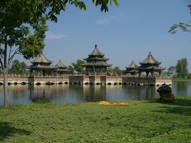 View of buildings over water at the Ancient City in Bangkok, Thailand