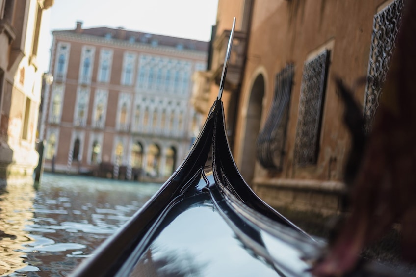 The Bow of a Gondola on a Venetian canal
