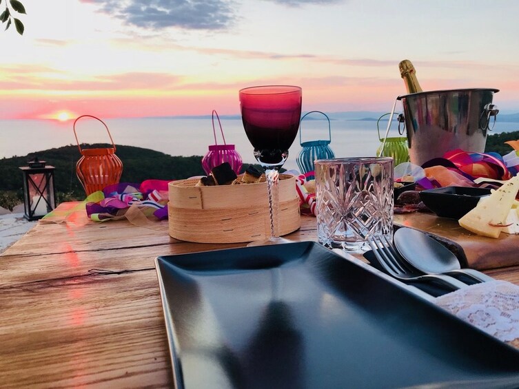 Show item 2 of 10. Bohemian romantic sunset dinner