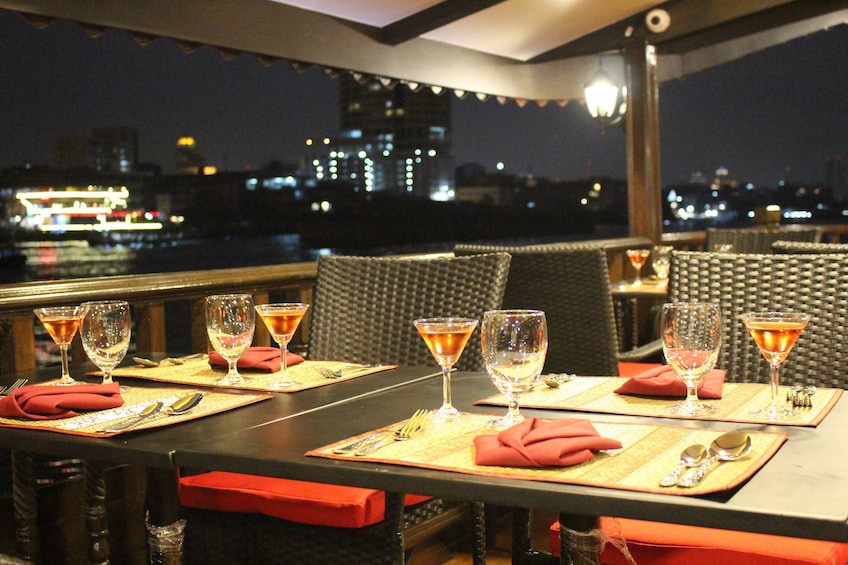 Table setting aboard the Chaophraya dinner cruise