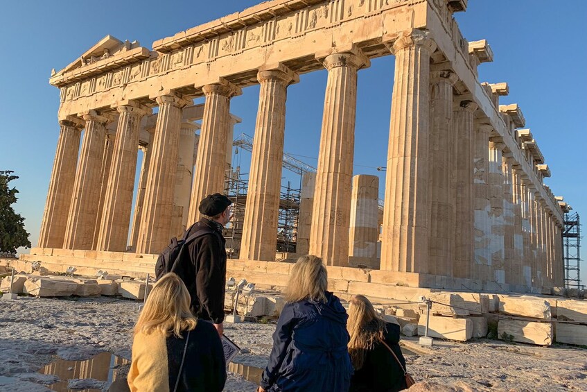 Tour group looks on at the Parthenon