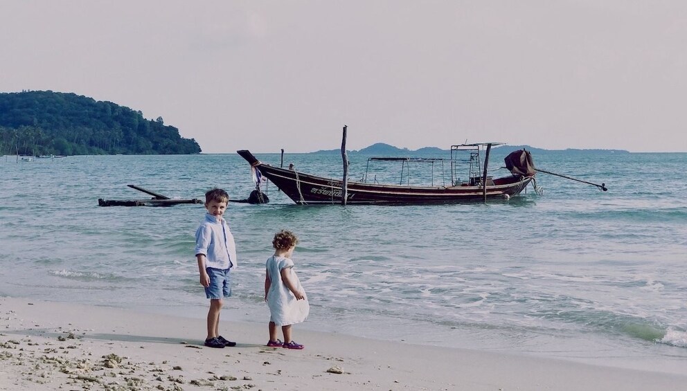 Two little kids on beach in Thailand