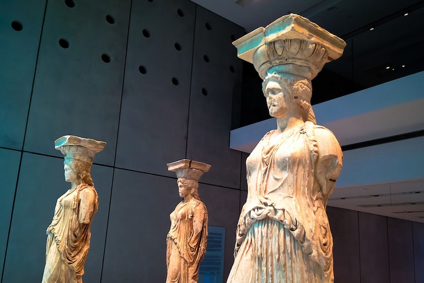 Marble statues on display at the Acropolis Museum