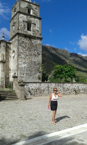 Woman outside of San Javier Mission in Mexico