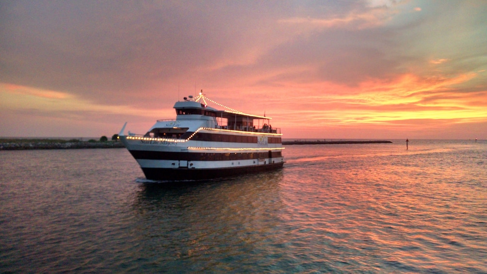 Cruise ship on water in Clearwater, Florida at sunset