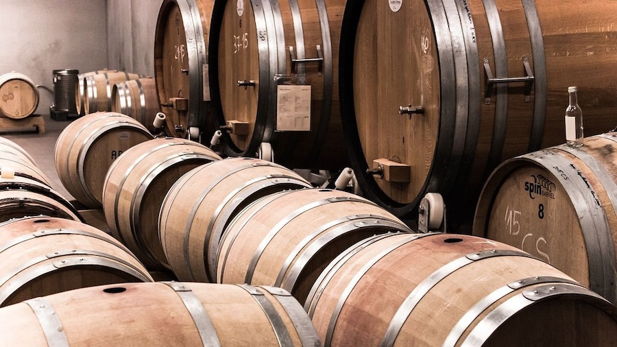 Aerial view of large, wooden barrels of Prosecco
