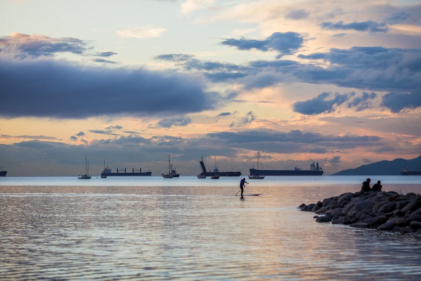 Stand-up paddleboarder in Water off the coast of Vancouver