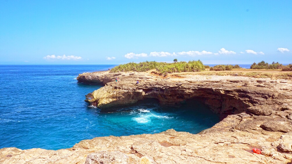 Show item 2 of 9. Small cove on the coast of Nusa Lembongan