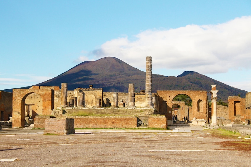 Pompeiian ruins with Mount Vesuvius in the background