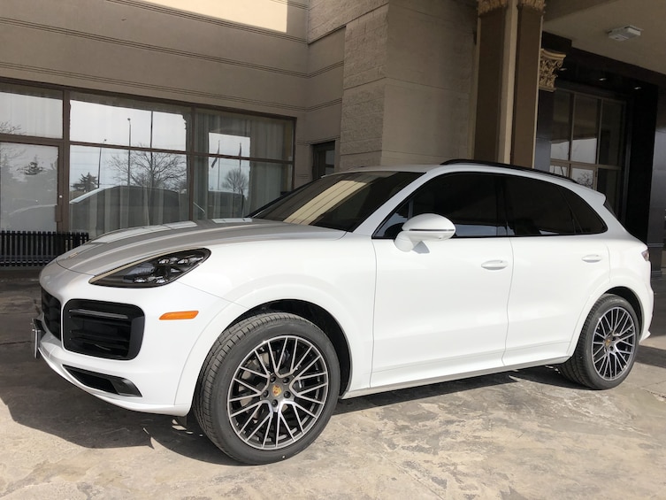 Side of white Porsche near Niagara Falls