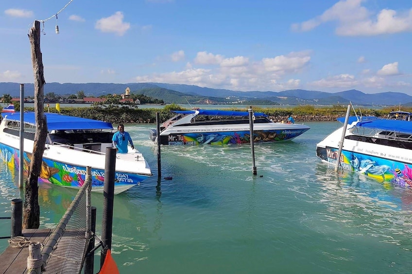 Three Mr. Tu boats docked in Thailand