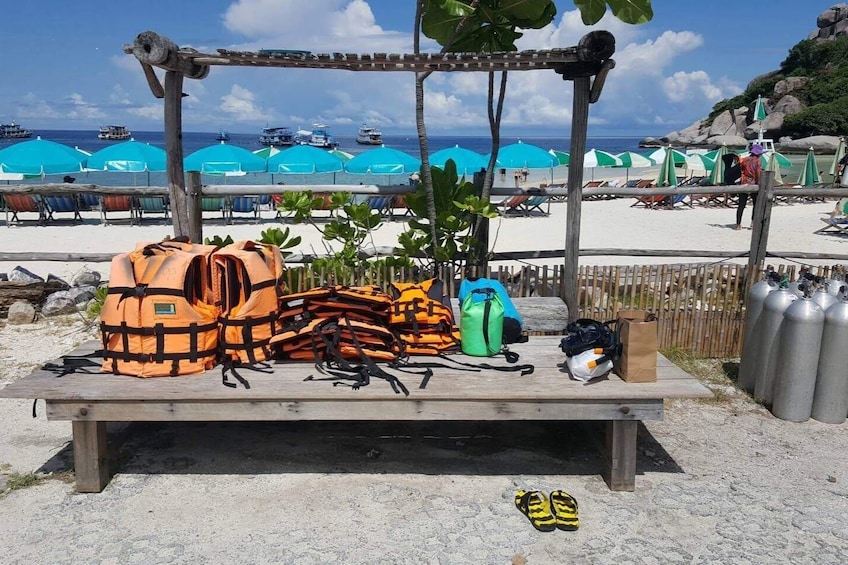 Life jackets on bench by the beach in Nang Yuan Island