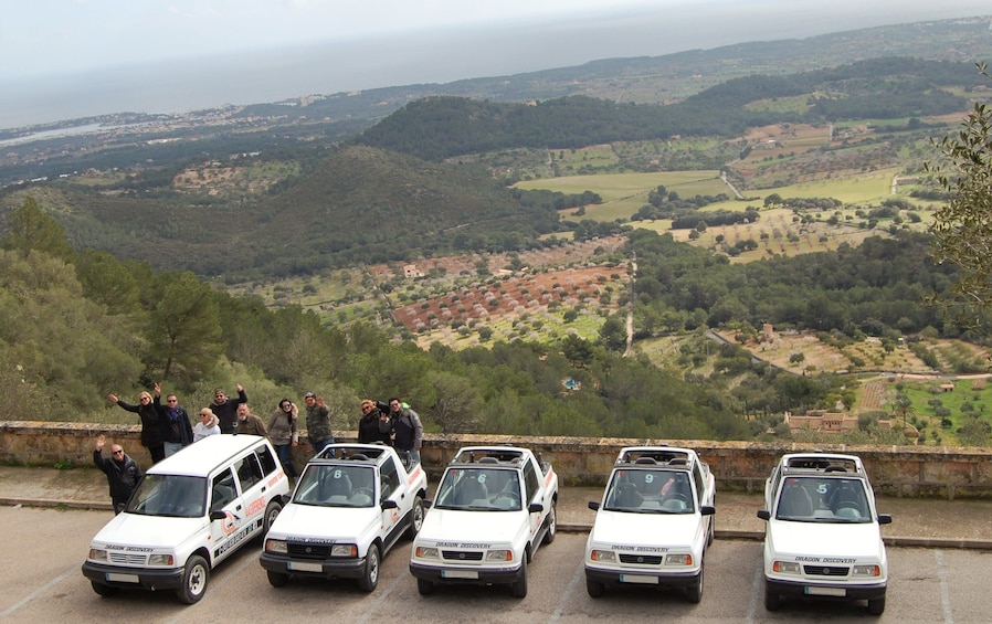 Five jeeps and small group at lookout in Mallorca