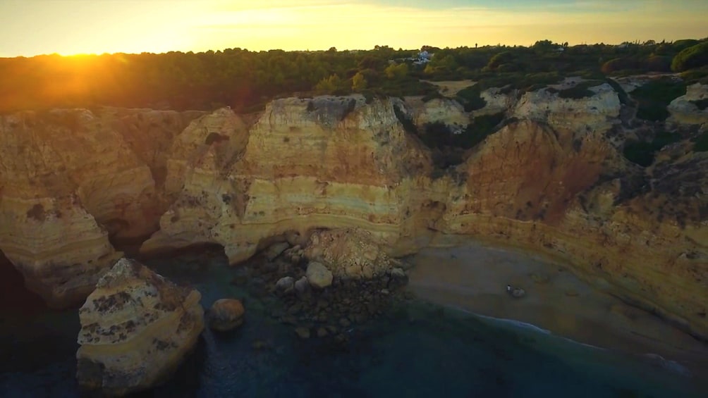 Aerial view of Benagil Caves at sunset