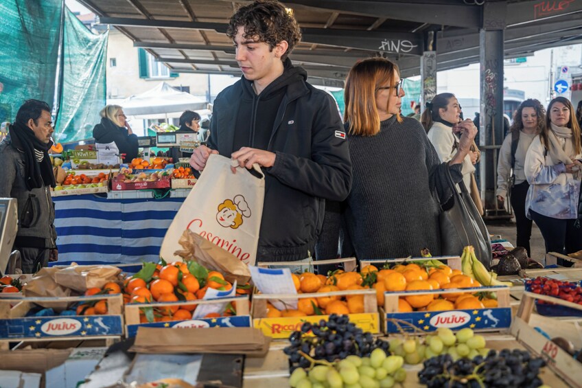 Market tour and dining experience at a Cesarina's home in Altamura