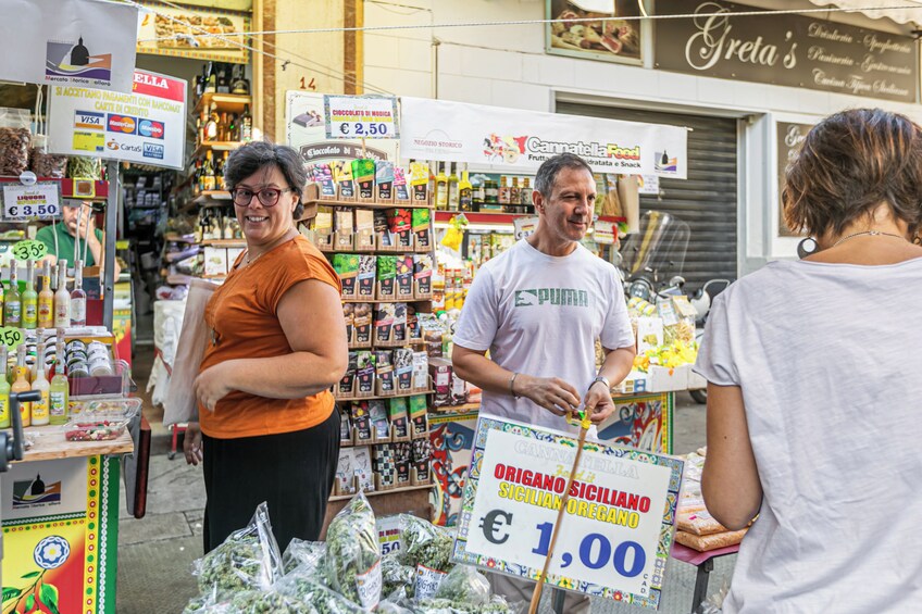 Market tour and dining experience at a Cesarina's home in Marsala