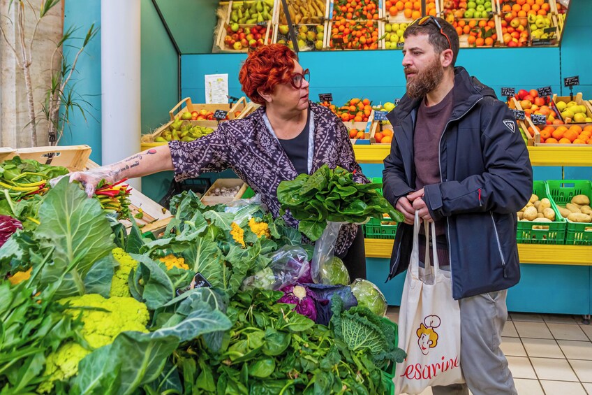 Market tour and dining experience at a Cesarina's home in Ragusa