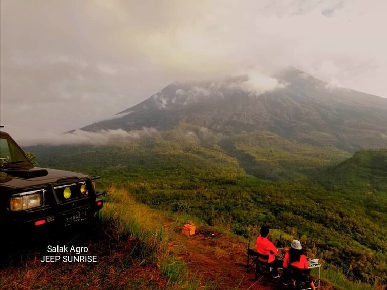 Jeep parked in mountains on a hazy morning in Bali