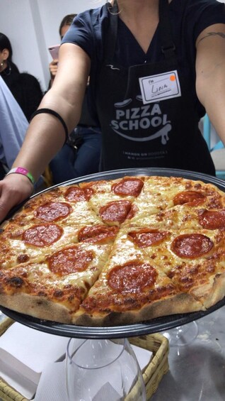 Show item 4 of 5. Private Pizza Workshop + Bottle of wine + transportation.