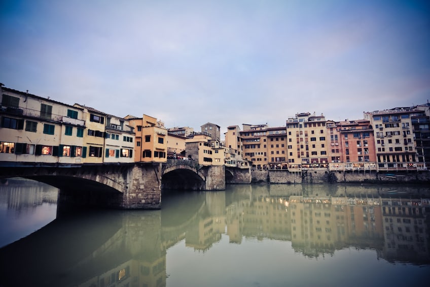 Day view of the Ponte Vecchio Closed-spandrel arch bridge in Florence, Italy
