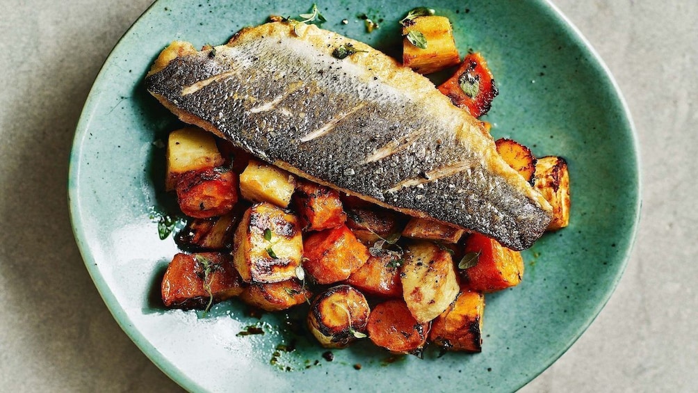 Plate of salmon and vegetables